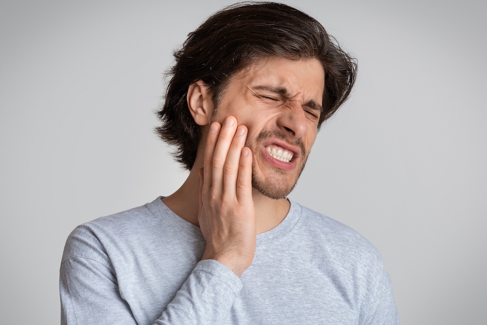 The pain is keeping the man down, he has not been to our dental clinic in Salmon Arm